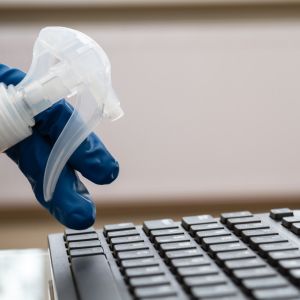 keyboard being sanitized 